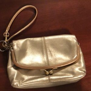 Gold coach wristlet